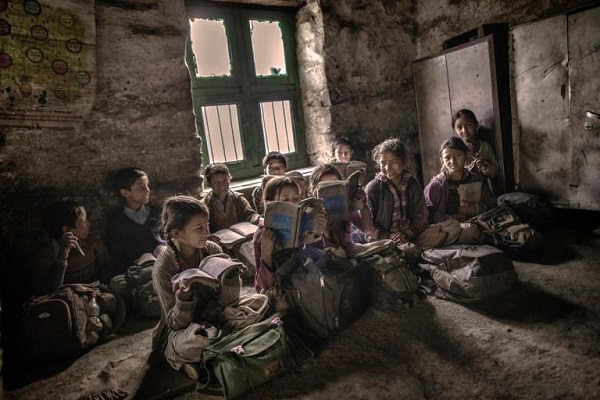 After a few years of education, many children seeking more advanced studies will walk to other villages—somtimes hours away. PHOTOGRAPH BY ANDREA DE FRANCISCIS