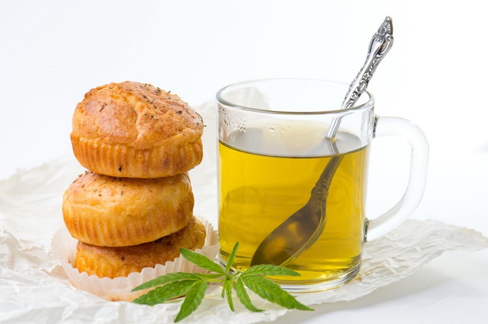 69790295 - marijuana cupcake muffins and hot cannabis tea